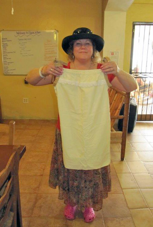 Garvey displays a pillowcase dress which was donated by a volunteer at Glenwell for her trip to Haiti.