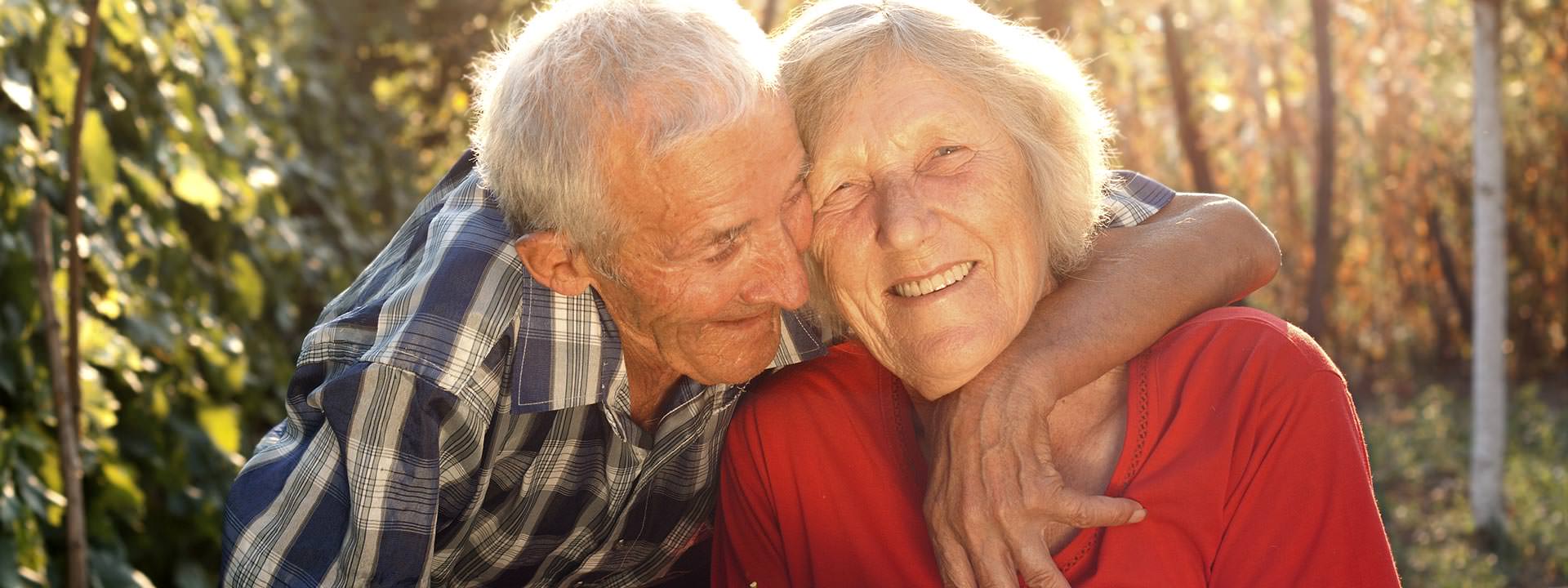 DePaul Banner Senior Living Elderly Couple Smiling Outdoors