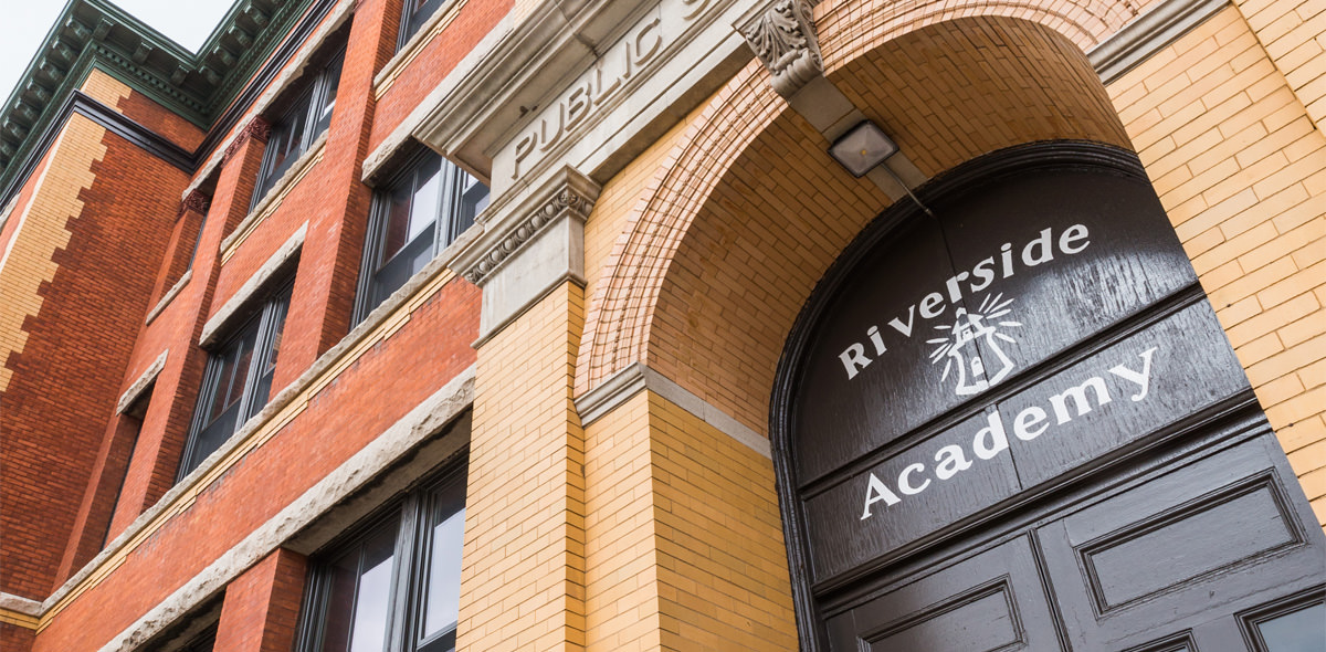 Riverside Apartments Riverside Academy Sign