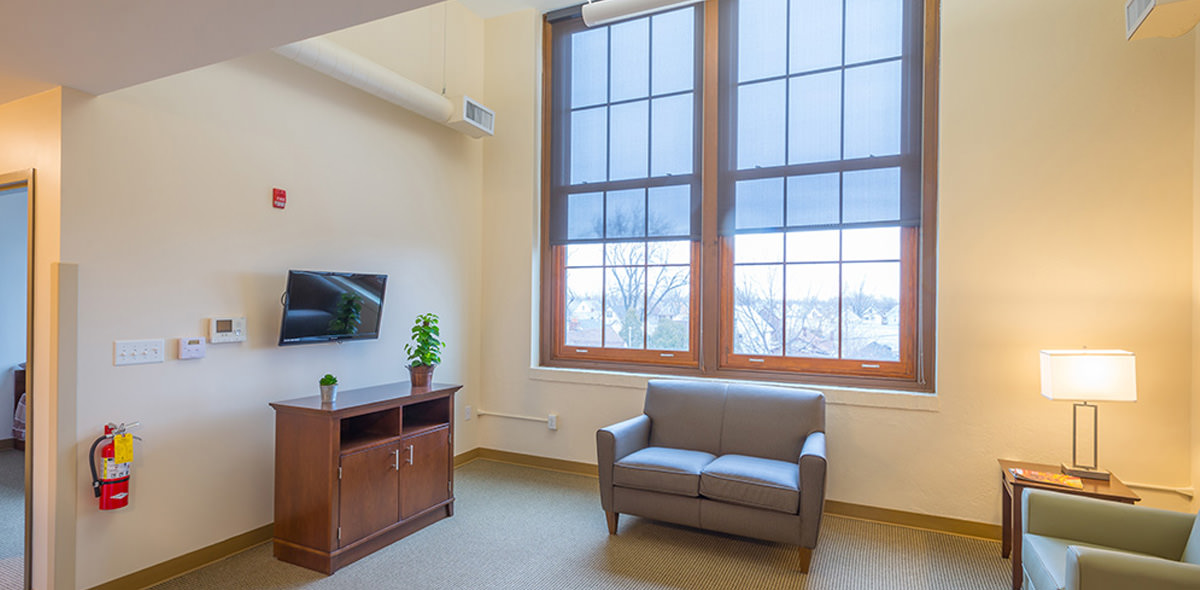 Riverside Apartments Living Room with TV