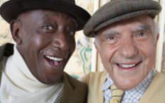 African american and white elderly men smiling