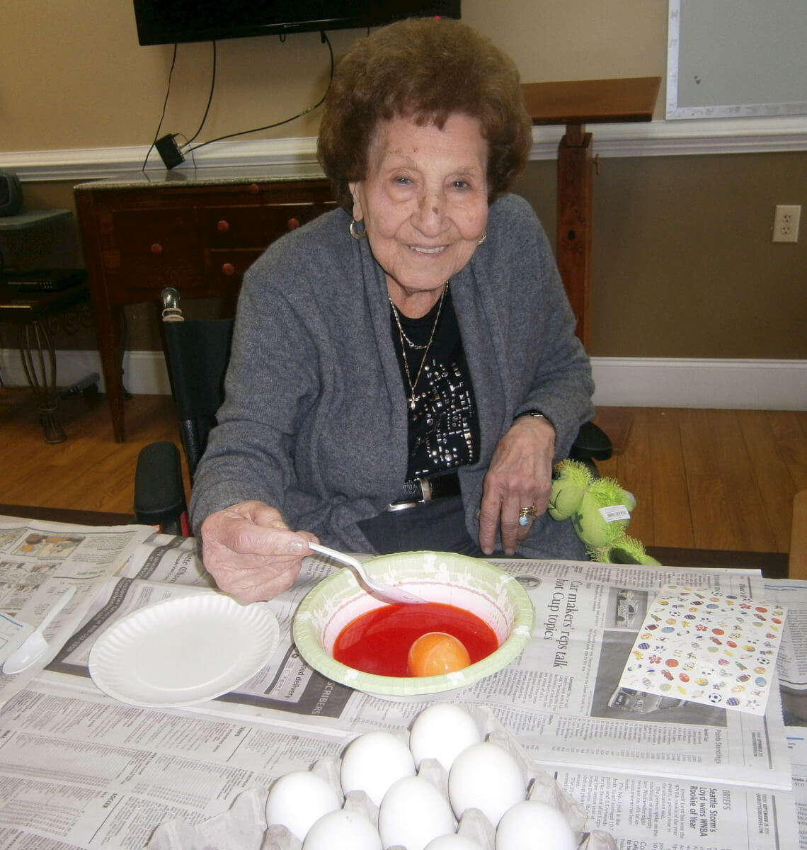 Wexford House resident Frances Genta coloring Easter Eggs