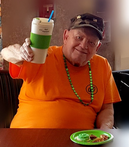 Heath House resident Benedict Pepitone raising his glass at the St. Patrick’s Day Social