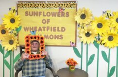 One Wheatfield Commons Residents With Sunflowers Display