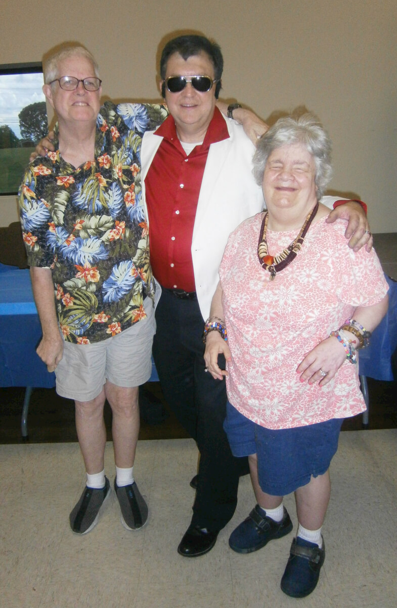 Willie Nelson/Johnny Cash/Elvis impersonator, pictured here with Wexford House residents Rick Taylor and Valerie Rogers.