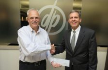DePaul President Mark Fuller Receives Check from First Niagara Vice President John Berry
