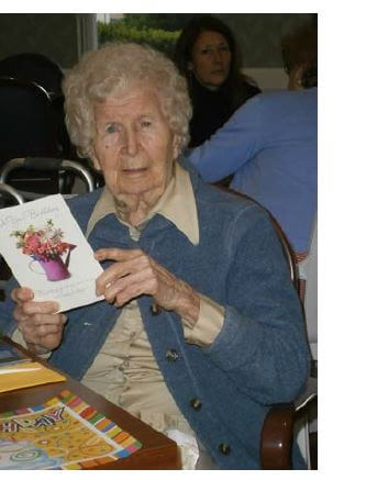 Glenwell resident Florence Raczynski opening her birthday card