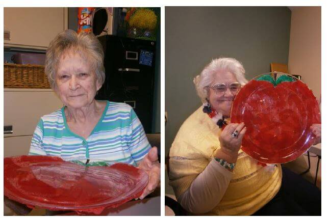  Hickory Village Memory Care residents celebrated Rosh Hashanah by creating apple plates