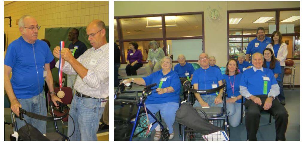 Horizons resident Paul Lang receives a medal for his performance in golf from DePaul’s Recreation Supervisor Dan Charcholla and other resident participants