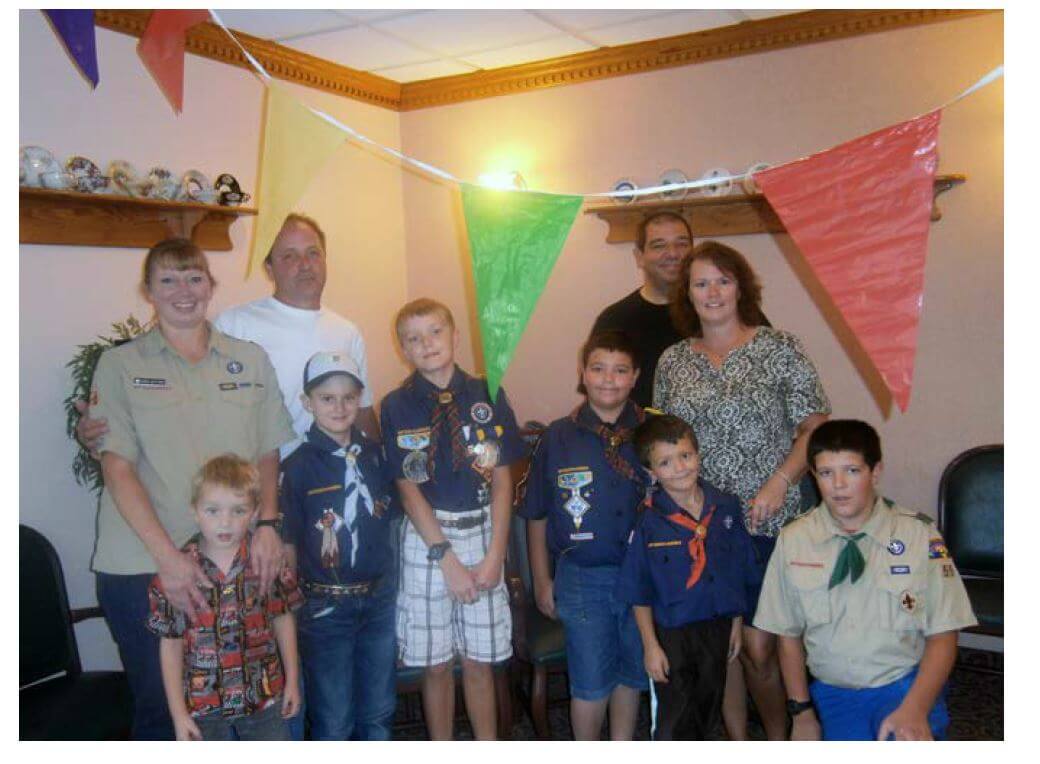 Volunteers (front row, left to right) Ty Naffziger, Bear Scout Cub Wyatt Wadams, Arrow of Light Cub Scout Hayden Naffziger, Webelos Cub Scout Garrett Lester, Tiger Cub Scout Holden Lester and Boy Scout Justin Lester, along with adults (back row, left to right) Karen and Ralph Naffziger and Carl and Amanda Lester at Horizons