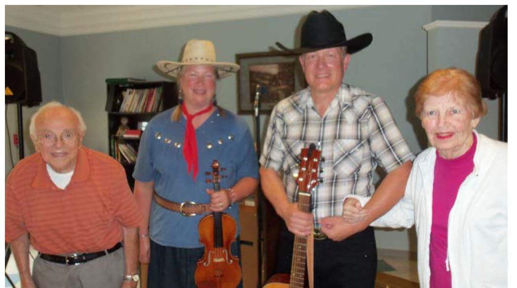 Westwood Commons residents Frank DiNitto and Betty Kates get to know Rick and Margie Jordan, a national touring country act 