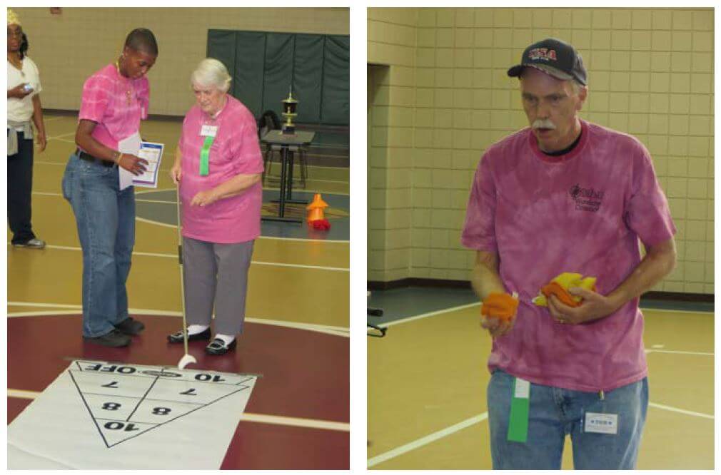 Woodcrest Commons Activities Assistant London-Paris Sanders assists resident Marilyn Goldstein in a game of shuffleboard and Tom Armstrong competes in the bean bag toss