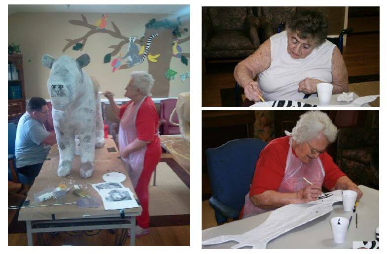 Wexford House residents Lester Reinhardt, Joyce Beard and Joan Conway painting and creating paper mache animals.