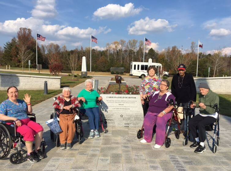 Group photo of Southfork residents who visited the Carolina Field of Honor