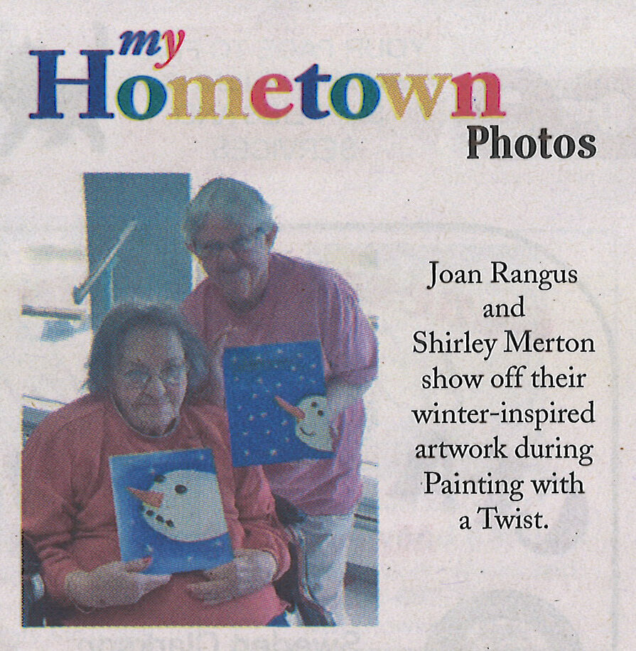 Woodcrest Commons residents Joan Rangus and Shirley Merton show off winter inspired artwork