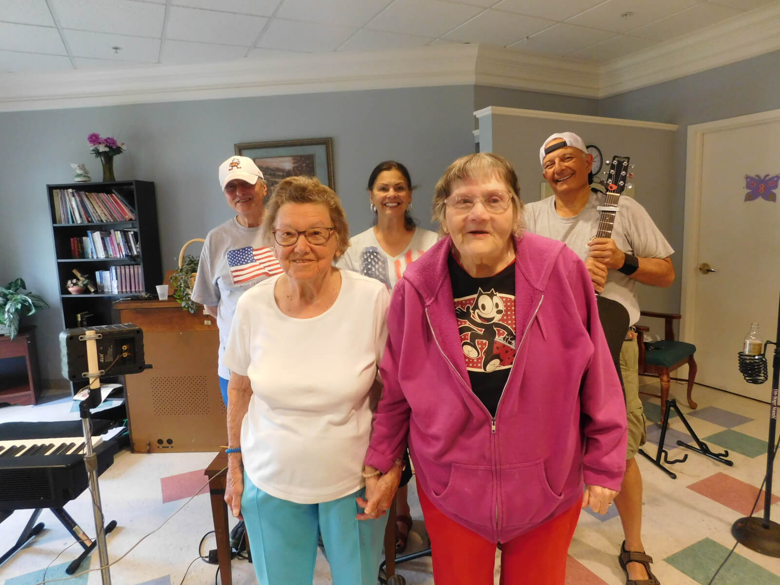 Westwood Commons residents Mary Light and Barbara Sabatini with Sorbello, Furiso and DelVecchio of Just Us!