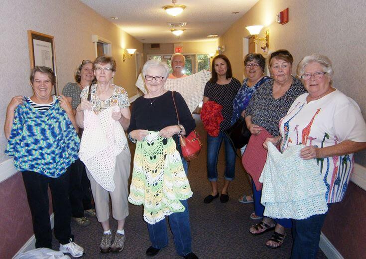  Catawba Crafters pictured above include co-founder Jo Boone, Carmilla Isenhour, Quilla Mayo, Cecil Riley, Darlene Wooten, Diane Riley, Betty Price, and Carol Mcvean