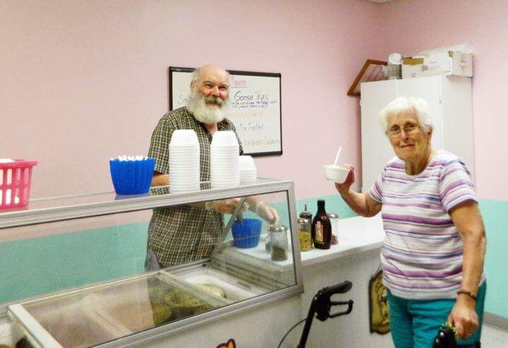 Resident Ed Zeller is pictured here serving scoops to resident Joanne Hackett