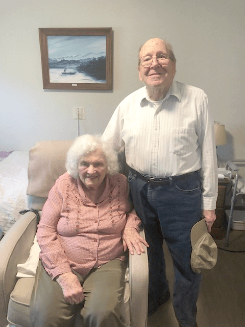 Elderly couple posing