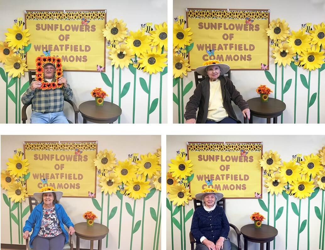 Four Wheatfield Commons Residents With Sunflowers Display