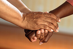 Staff Support For Residents Clasped Hands