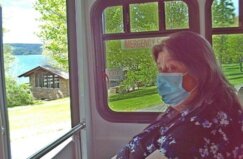 Janet Schutt takes in the sights during a sightseeing trip to Keuka Lake and Keuka College