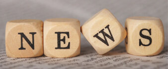 Wooden letters spelling out news