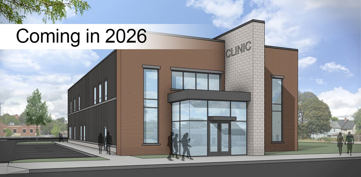 Rendering of a building and blue sky. Text banner says Coming in 2026.
