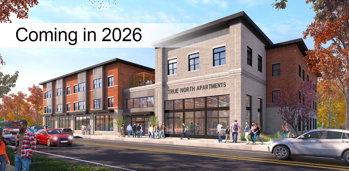 Rendering of a building and blue sky. Text banner says Coming in 2026.