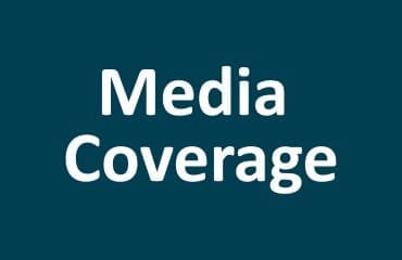 White text reading Media Coverage centered on a solid teal background.