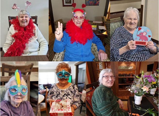 A collage of six older women sitting indoors, some wearing colorful costumes, boas, hats, or masks, smiling and holding Valentine’s Day-themed decorations and gifts. One woman sits at a table with a bouquet of flowers.