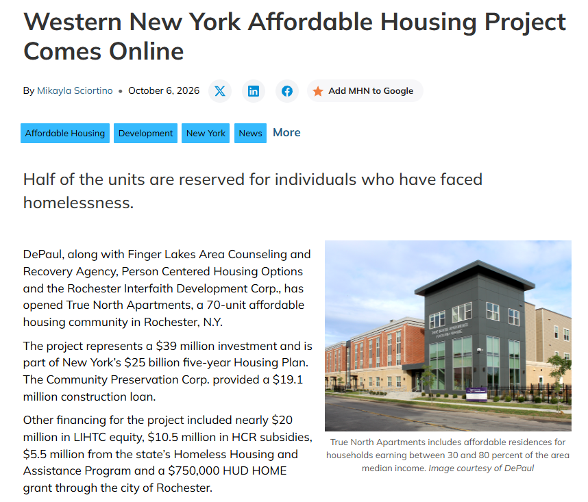 The modern, three-story True North Apartments building with a gray and brick facade.